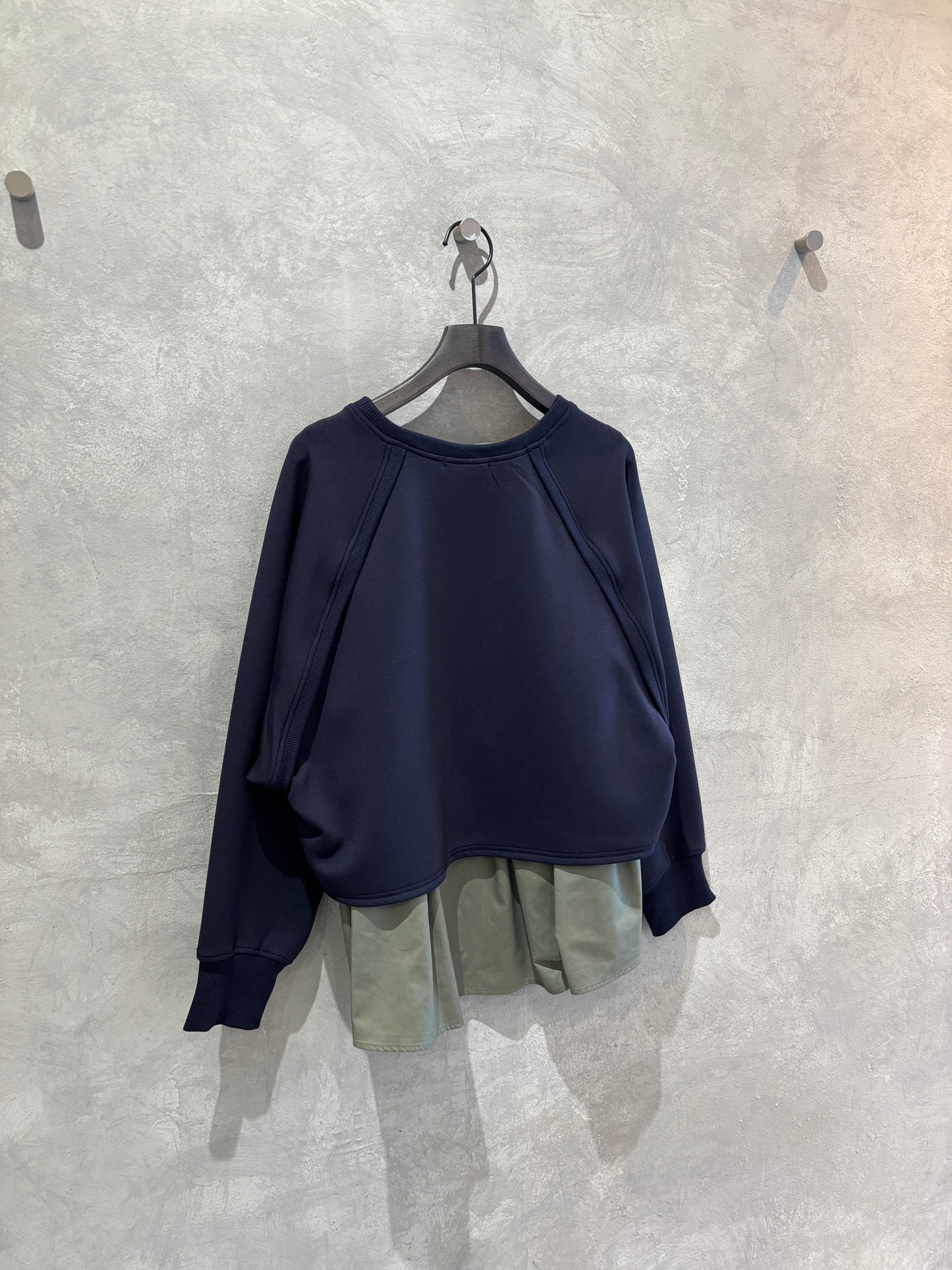 ドッキングフリルトップス／Trois