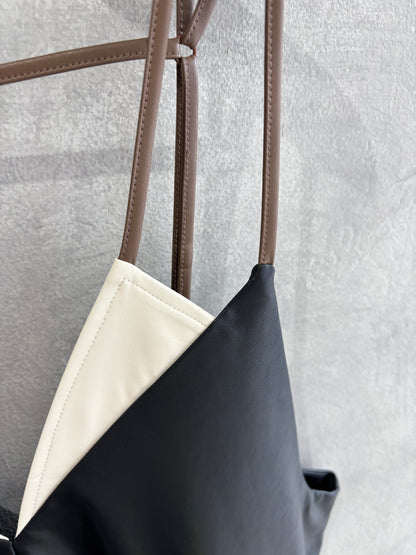 【再入荷】バイカラーフェイクレザージャンパースカート／LHELBIE