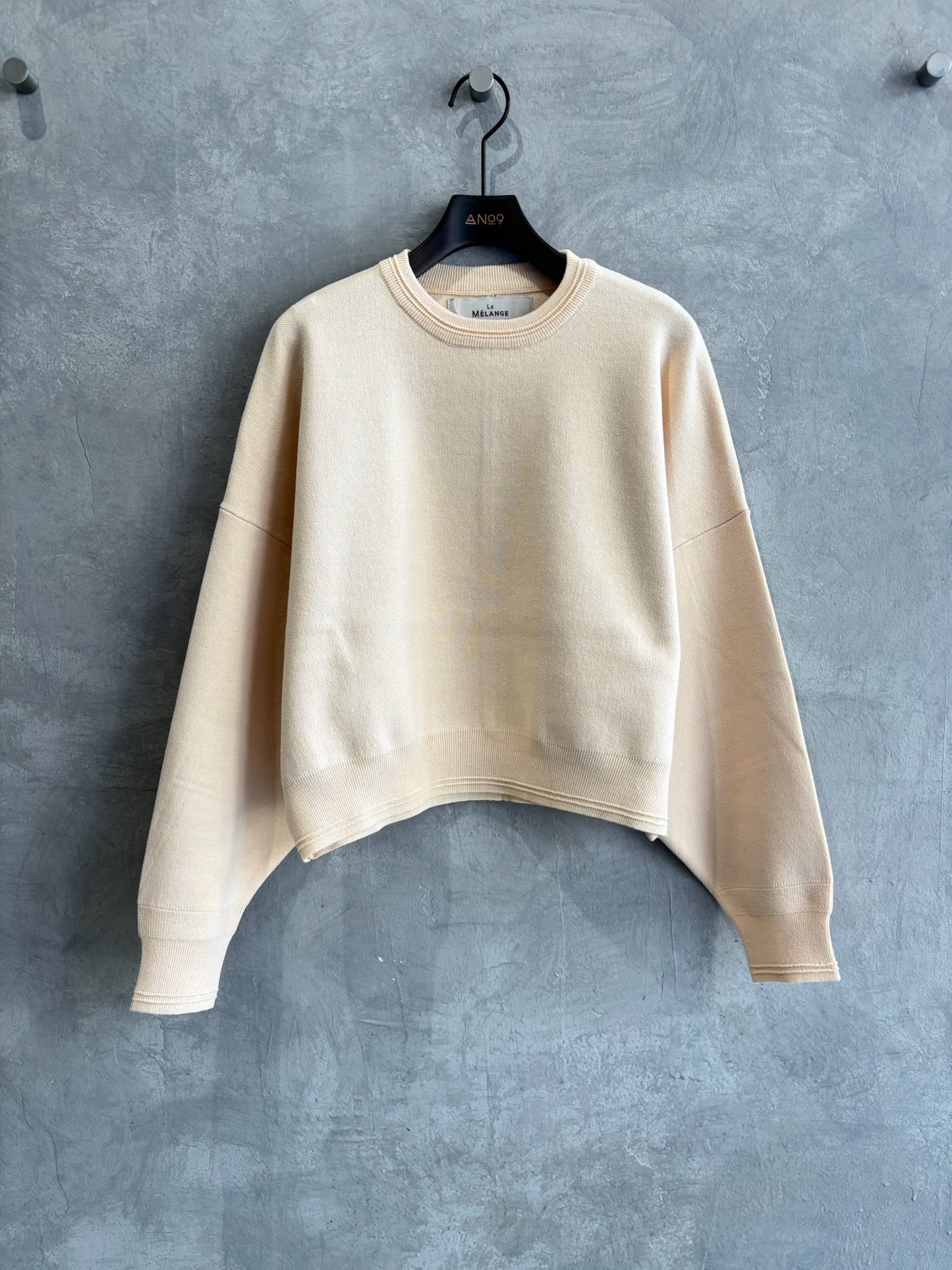 ショート丈ドルマンライクプルオーバーニット／LE MÉLANGE