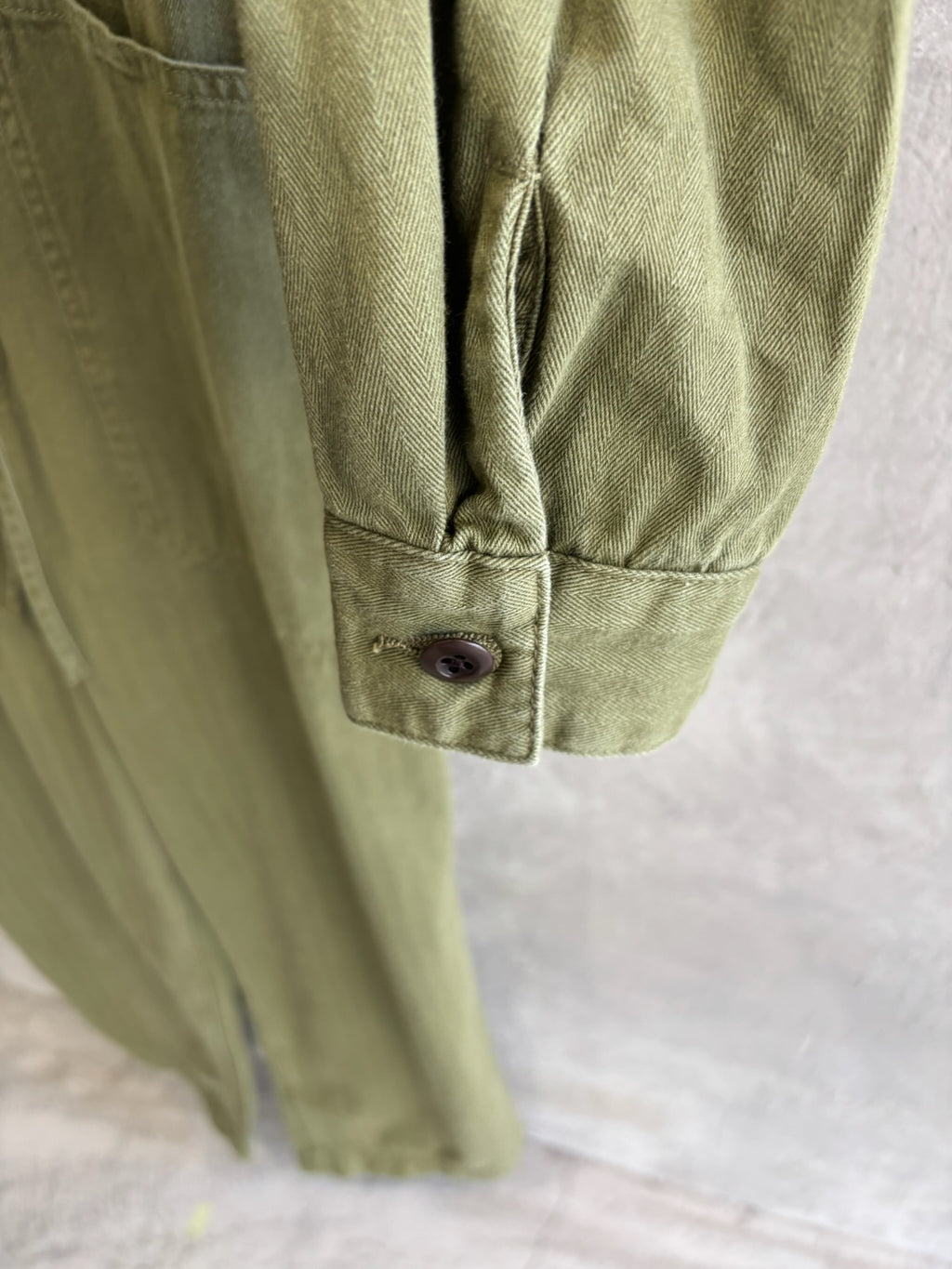 ヘリンボーンノーカラージャンプスーツ／LE MÉLANGE