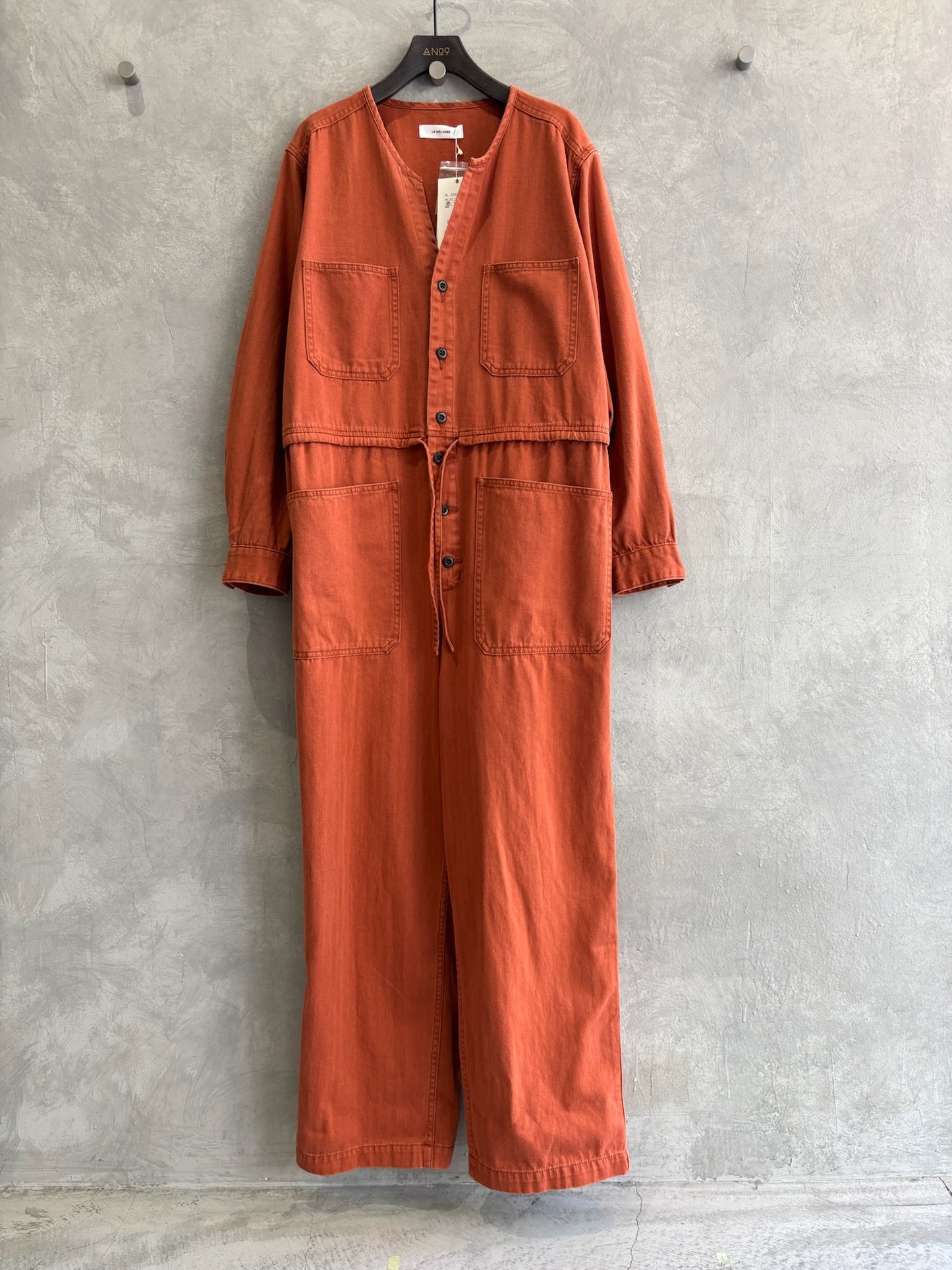 ヘリンボーンノーカラージャンプスーツ／LE MÉLANGE