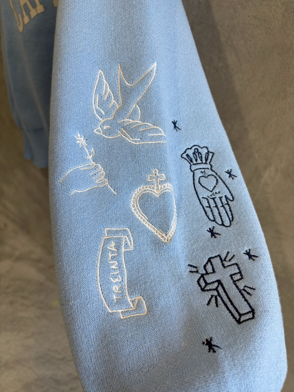 スウェットライク刺繍ニット／palm RICHE